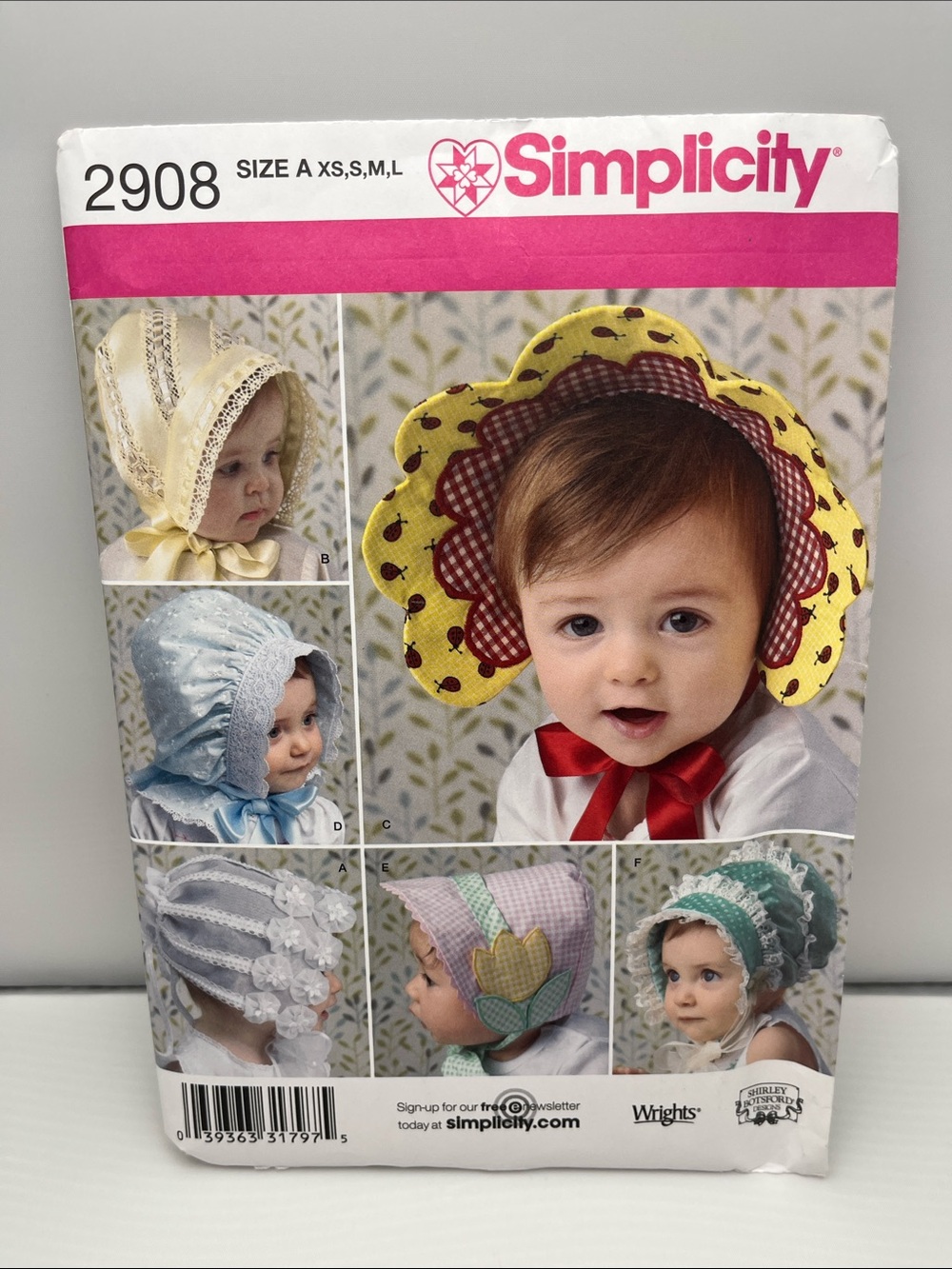 Simplicity Yellow and Red Floral Baby Sunbonnet Sewing Pattern